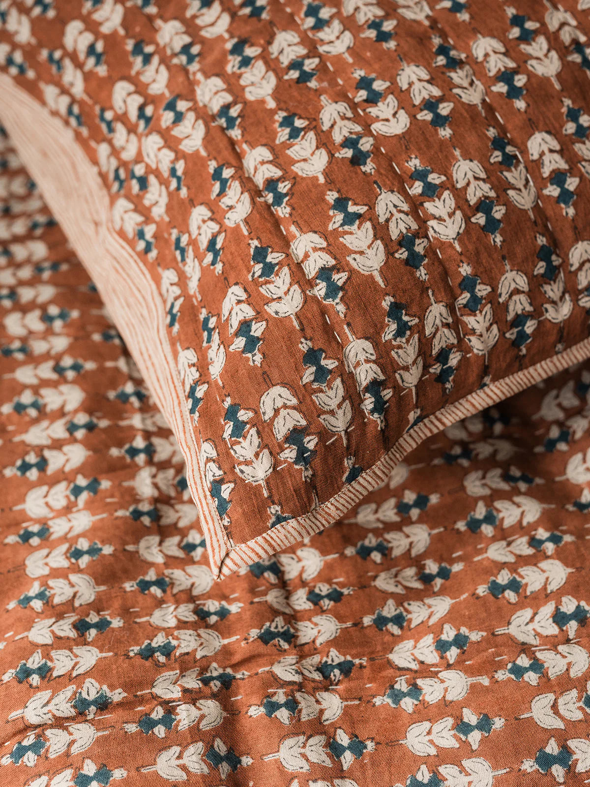 Blossom Block Print Quilt in Rust